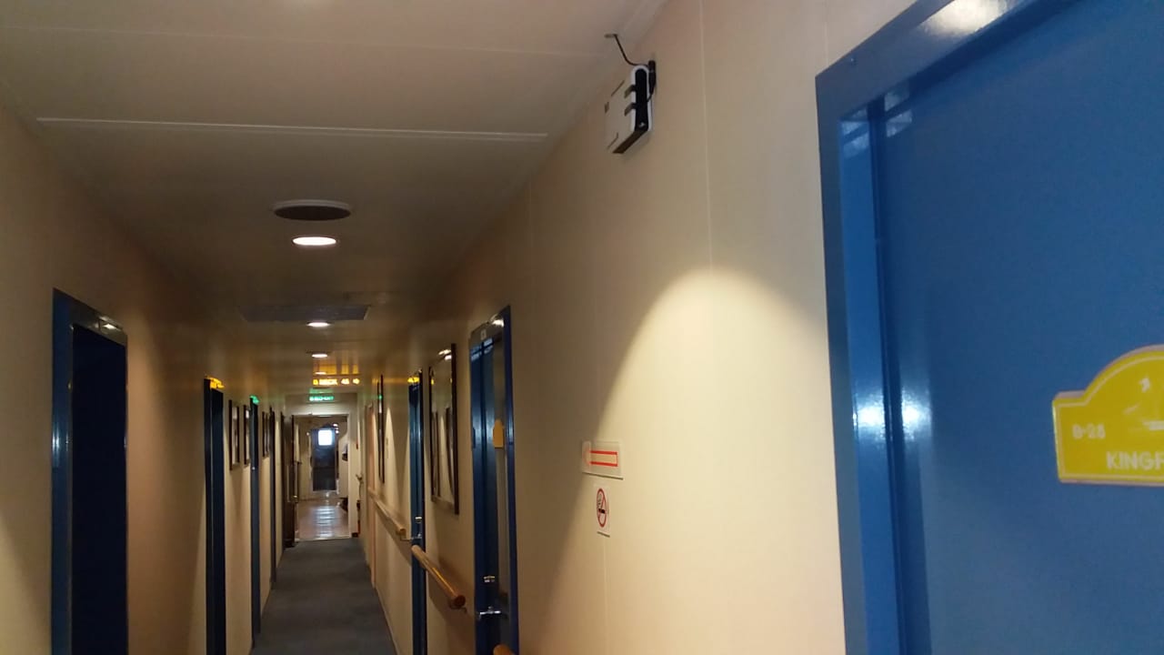 Signal repeater in corridor